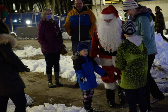 Calum smiling with Santa and Lauchlin