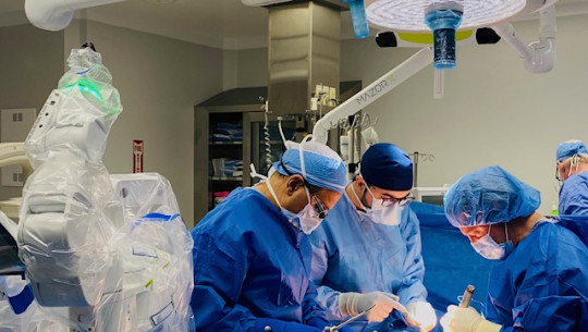 Teams complete Canada's first robotic-assisted surgery for pediatric scoliosis at the QEII last month, marking a historic milestone in surgical robotics and pediatric care (Source: Medtronic).