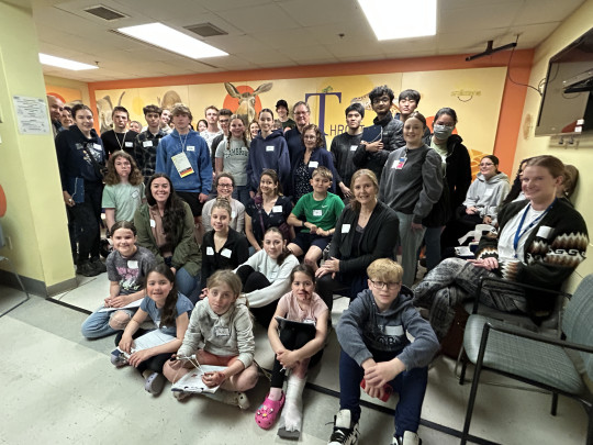 Group shot of community volunteers as simulation patients and families