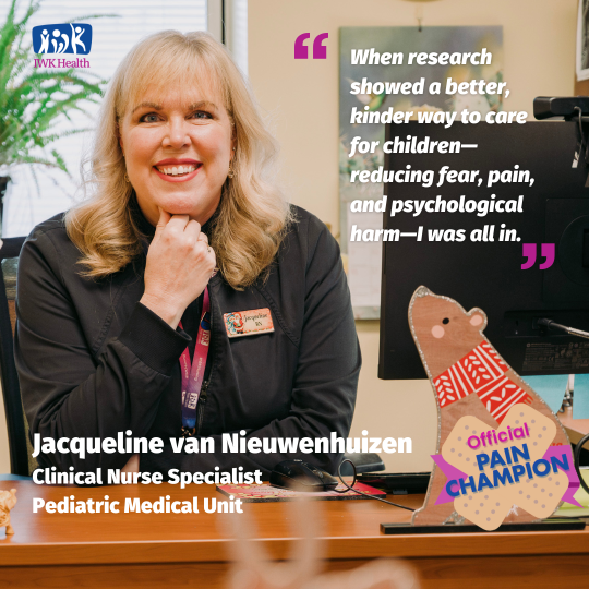 Jacqueline van Nieuwenhuizen sits at her desk.