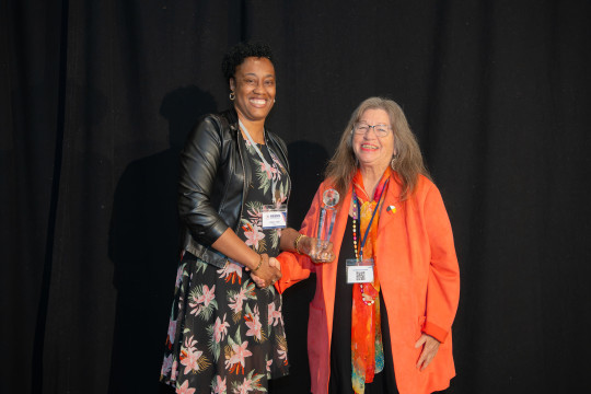 Karen Hall accepts her award for Internationally Educated Nurse of the Year.