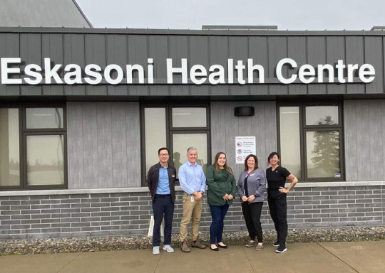 Clinicians stand outside the Eskasoni Health Centre