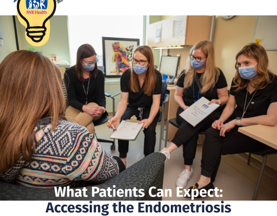 A group of health care clinicians interview a patient. 