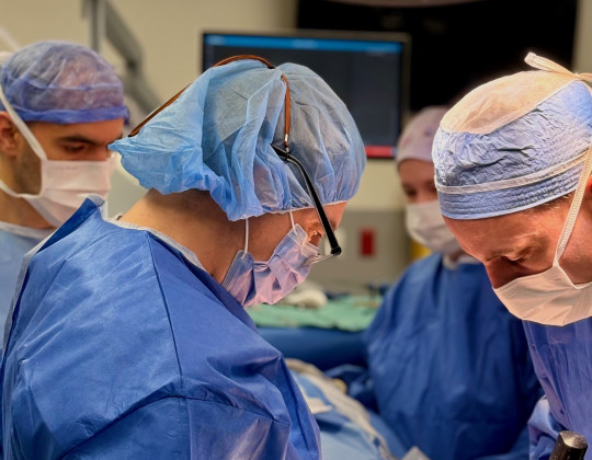 Surgeons in the operating room.