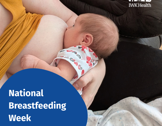 A baby breastfeeds. National Breastfeeding Week. October 1-7.