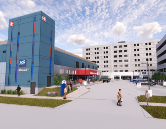 Rendering of the new emergency department features a blue tower with colourful stain glass strips running down the front.